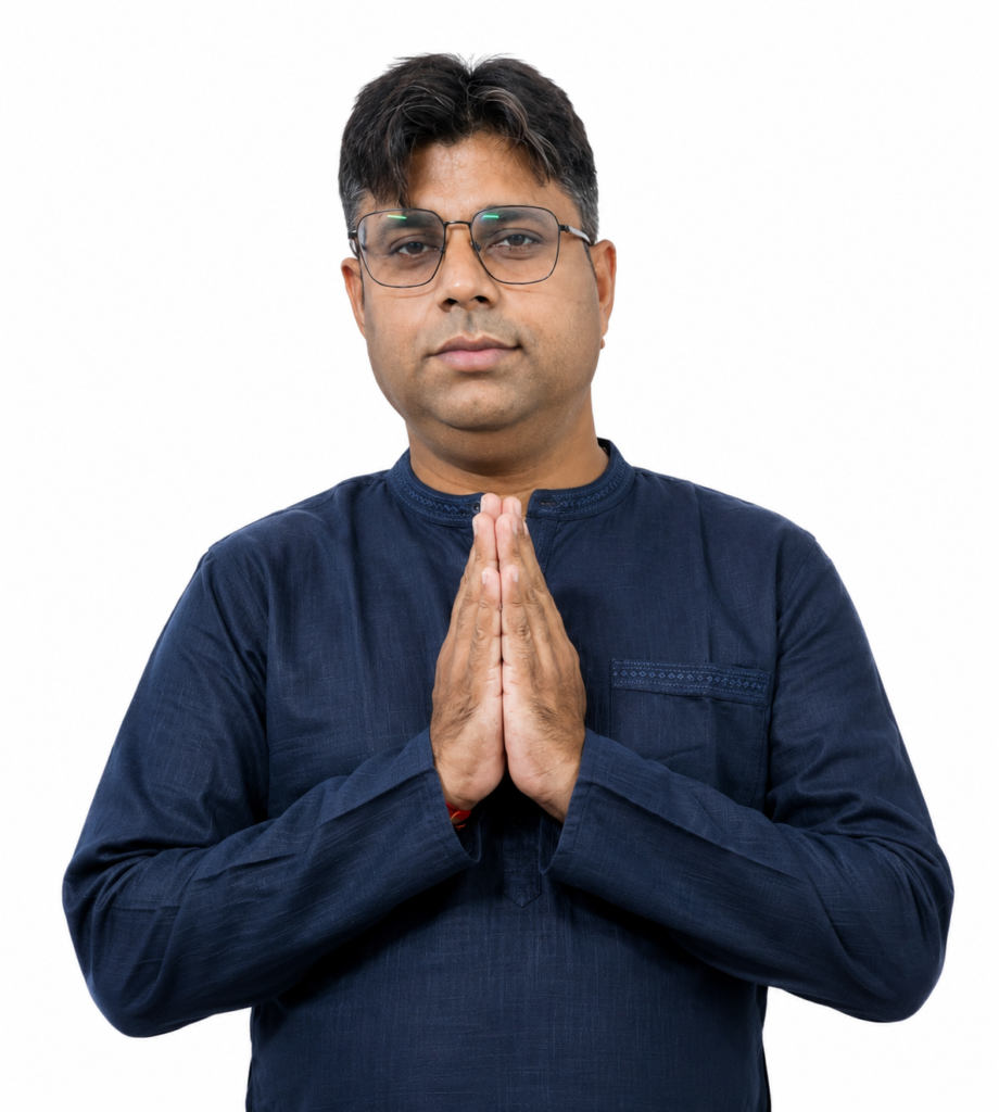 Meditation Ankur Saxena, founder of Ankur Arise, greeting with a traditional Namaste gesture in a blue kurta.